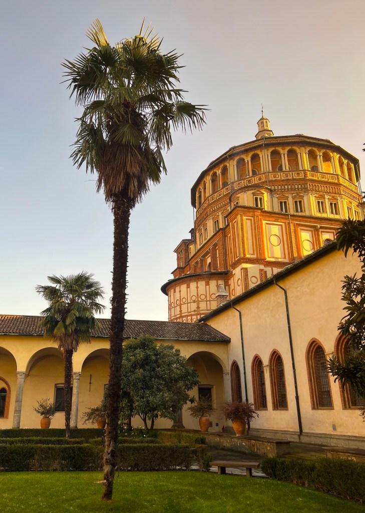 Courtyard with circular church in background
