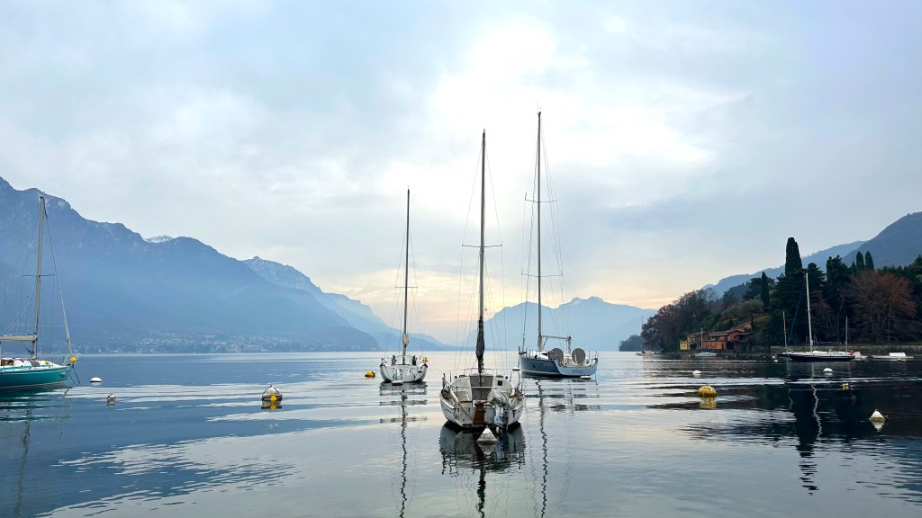 Fishing boats on calm lake