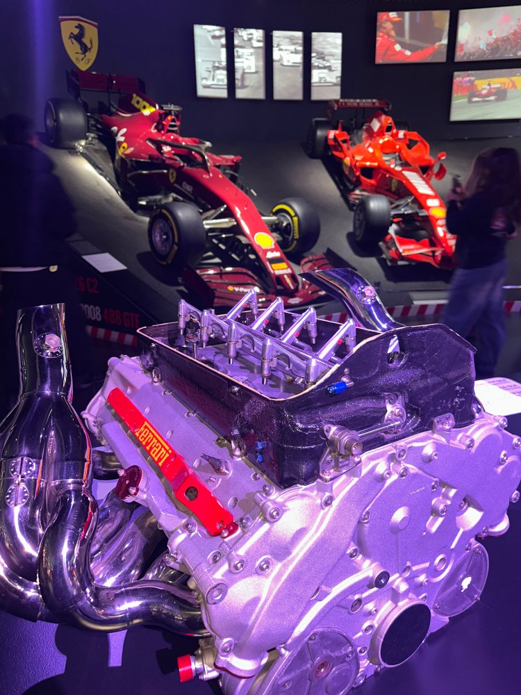 Car engine and Ferrari Formula 1 cars