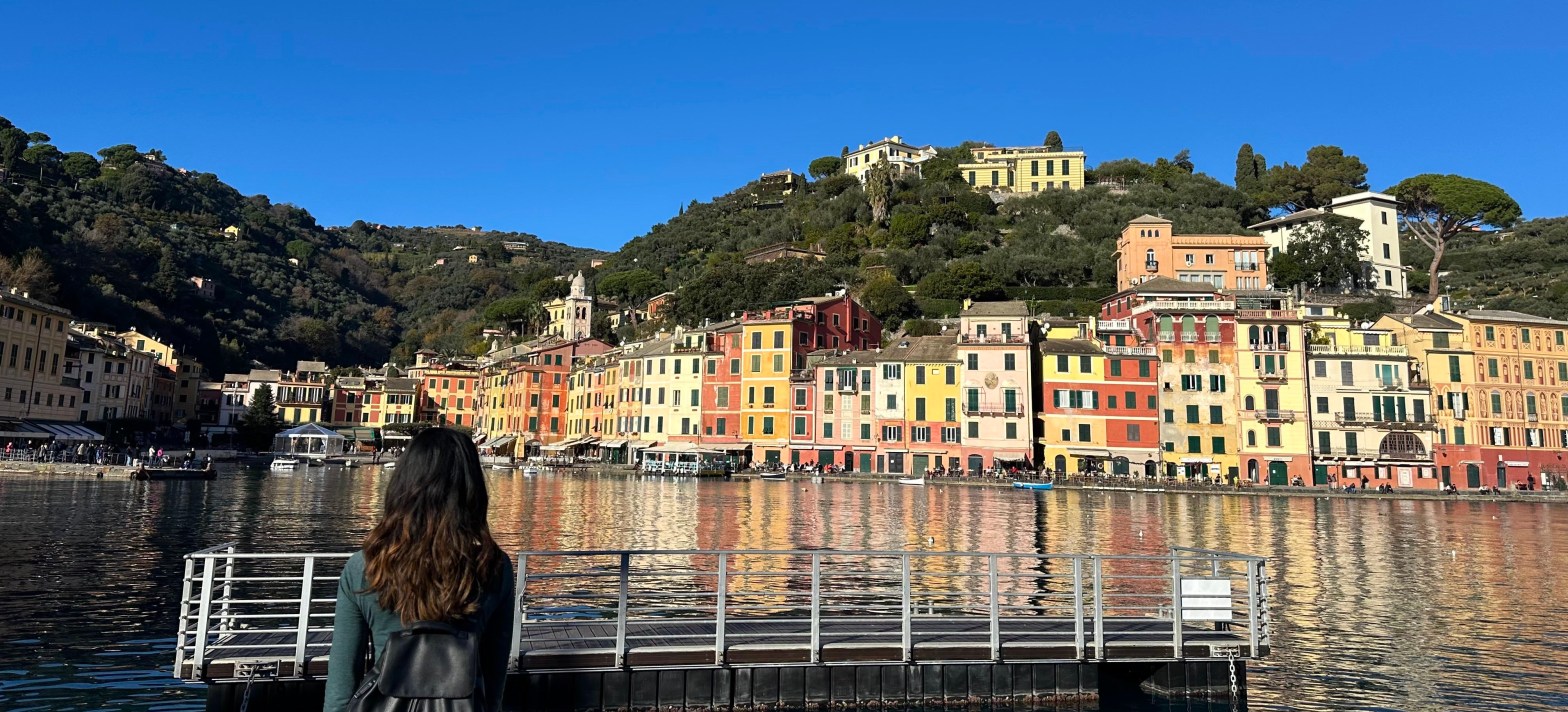 View of colorful buildings next to harbor