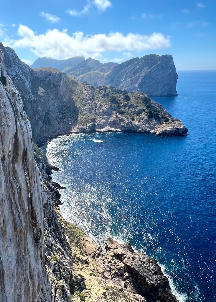 View of cliff and water below