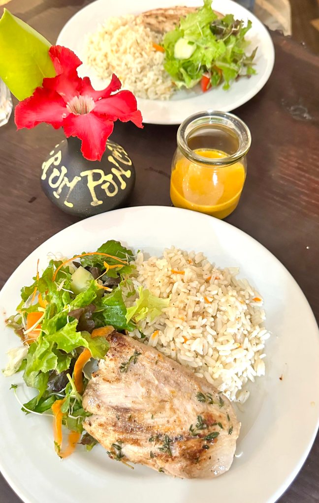 Mahi Mahi fish with rice and salad at Cutters of Barbados